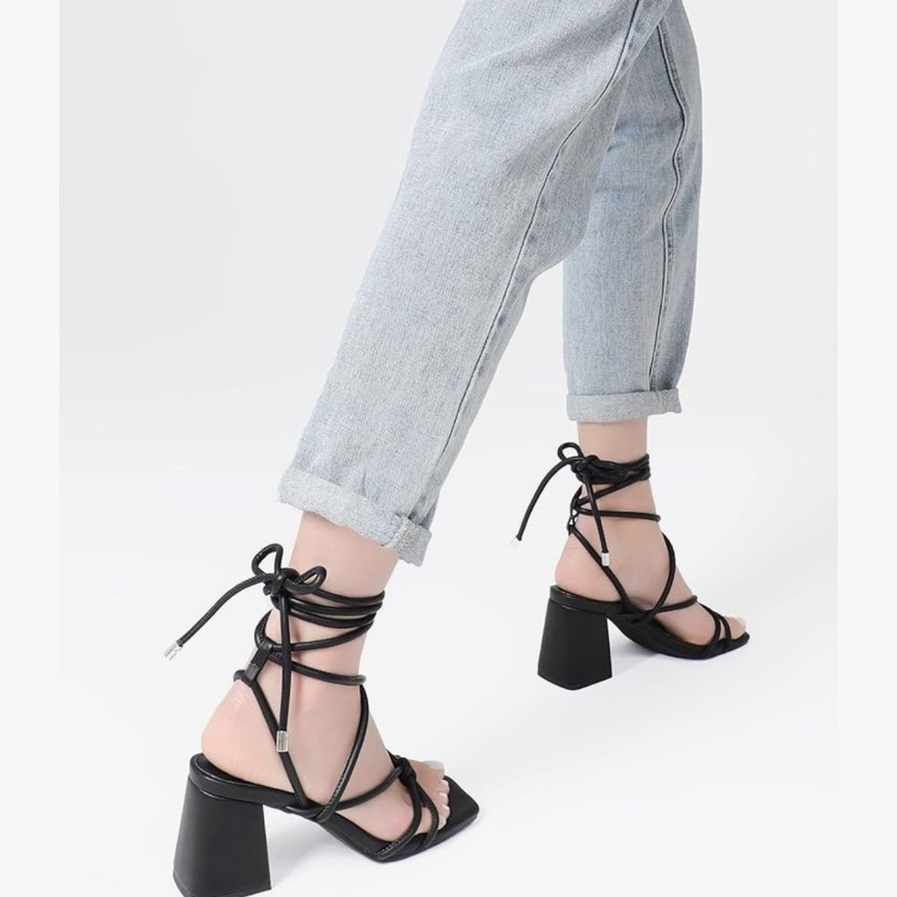 Black lace up heels. Worn once.